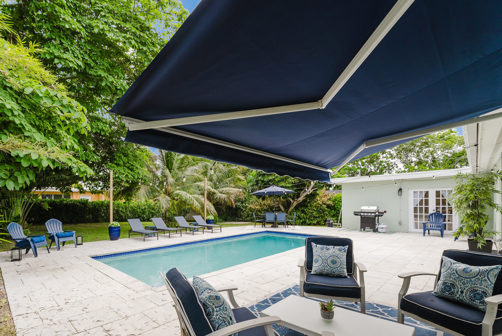 Covered patio seating by the pool